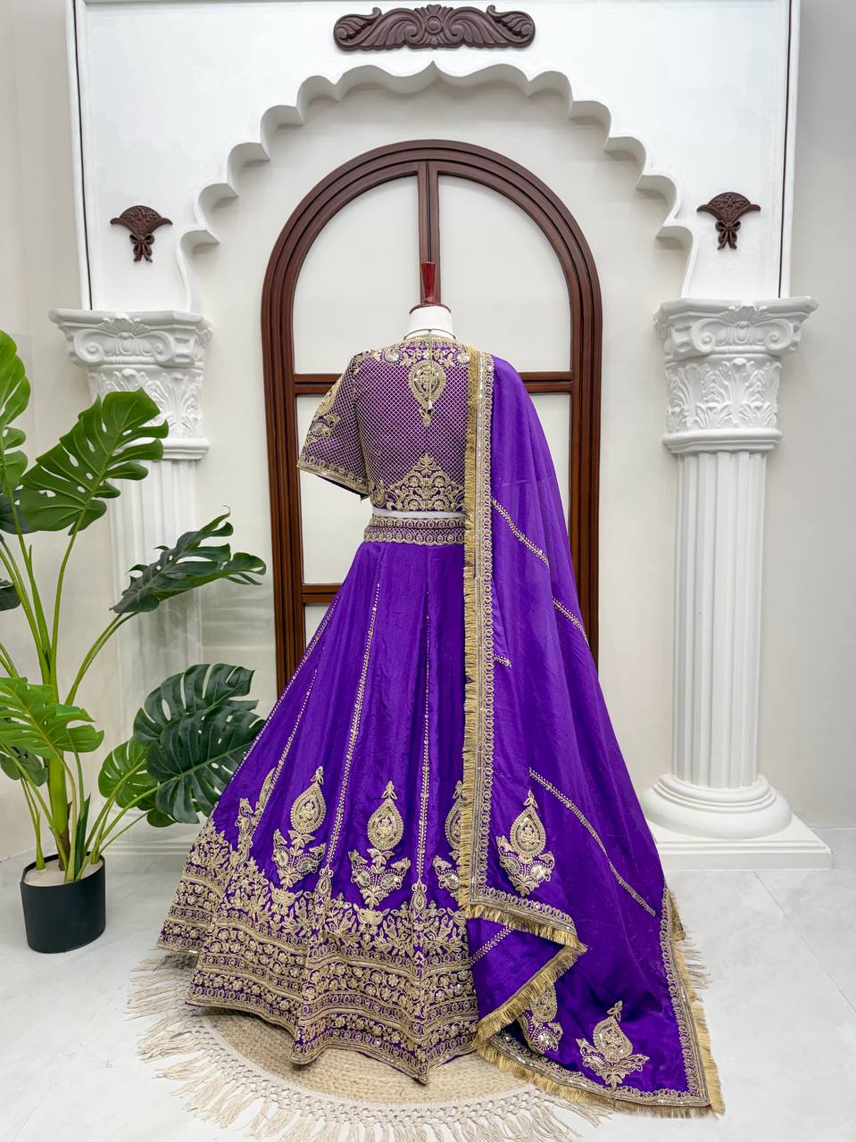Royal Amethyst Purple Silk Lehenga Choli with Majestic Gold Zari Heritage Motifs and Elaborate Borders